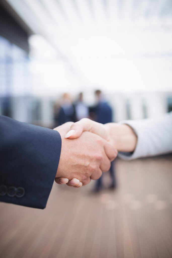 close up of businesspeople shaking hands